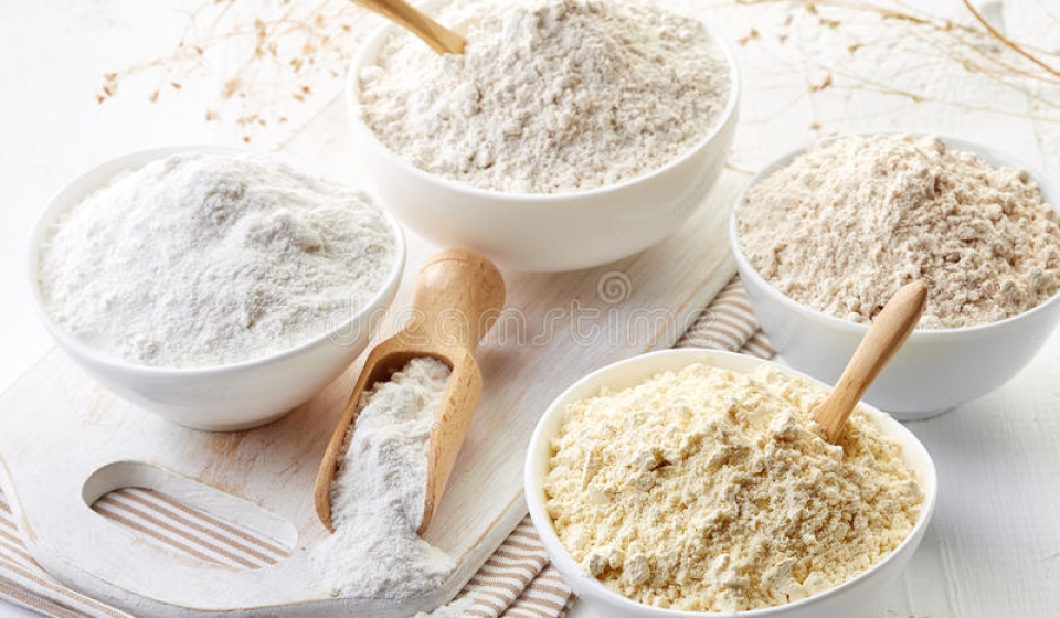 bowls-gluten-free-flour-various-chick-peas-rice-buckwheat-amaranth-seeds-almond-white-wooden-background-75592382